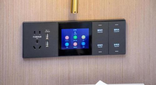 a wii remote control hanging on a wall at Lavande Hotel Guangzhou Quzhuang Metro Station in Guangzhou