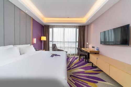 Postel nebo postele na pokoji v ubytování Lavande Hotel·Sihui Dawang