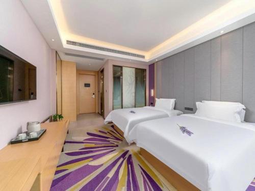 Postel nebo postele na pokoji v ubytování Lavande Hotel·Sihui Dawang