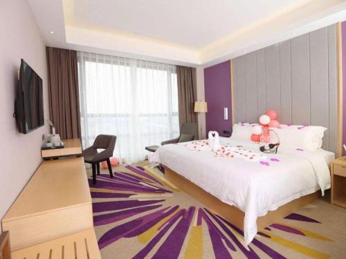 TV a/nebo společenská místnost v ubytování Lavande Hotel·Sihui Dawang