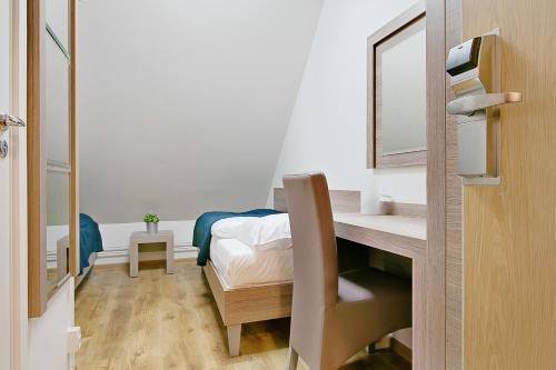Un ou plusieurs lits dans un hébergement de l'établissement Hotel Kringelstaden