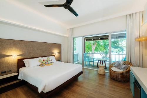 Veranda Resort & Villas Hua Hin Cha Amにあるベッド