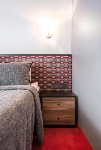 Cama o camas de una habitación en Viešbutis Simpatija