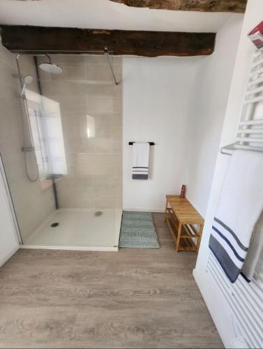 a bathroom with a shower in a room at SCI Maison Rouge 1 in Bonnac-la-Côte