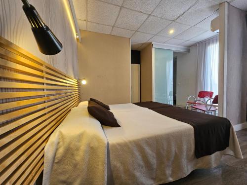 Cama o camas de una habitación en Hotel Palermo