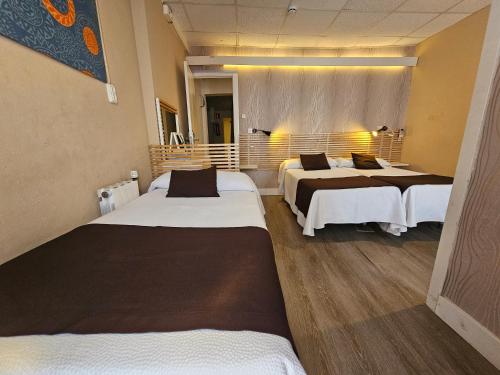 Cama o camas de una habitación en Hotel Palermo
