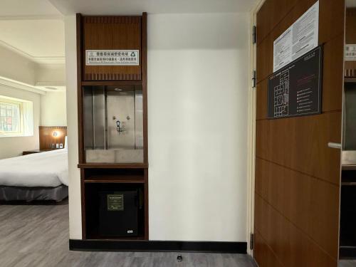 Cama o camas de una habitación en Hub Hotel Kaohsiung Cisian Branch