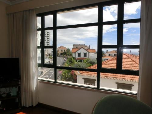 TV i/ili multimedijalni sistem u objektu Ladeira Centro