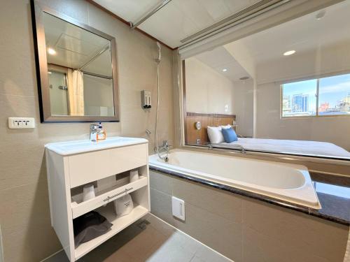 Cama o camas de una habitación en Hub Hotel Kaohsiung Cisian Branch