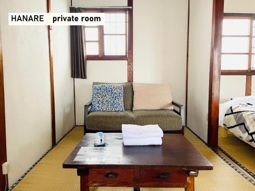 Ένα ή περισσότερα κρεβάτια σε δωμάτιο στο TAKIO guesthouse HANARE