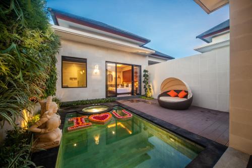Bazén v ubytování Gaing Mas Jimbaran Villas by Gaing Mas Group nebo v jeho okolí