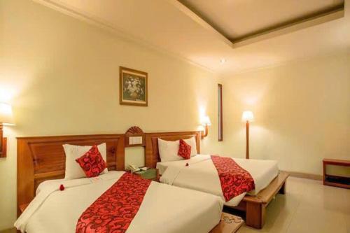 En eller flere senge i et værelse på Golden Sea Hotel Da Nang