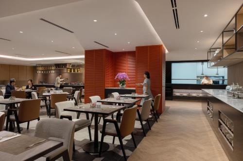 En restaurant eller et andet spisested på Wyndham Singapore Hotel