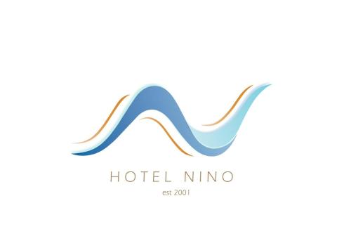 a logo of hotel nmc with a wave at Hotel Nino in Dhërmi