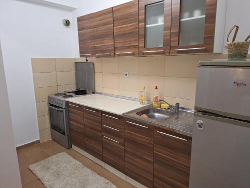 Η κουζίνα ή μικρή κουζίνα στο Daniels apartment