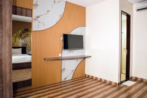 TV a/nebo společenská místnost v ubytování Grand Kesambi Resort and Villas Seminyak