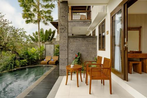 Bazén v ubytování Yanyan Resort Ubud nebo v jeho okolí