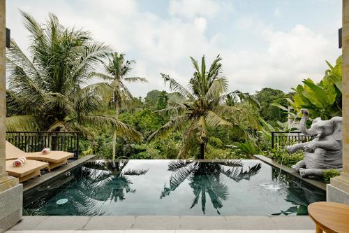 Bazén v ubytování Yanyan Resort Ubud nebo v jeho okolí