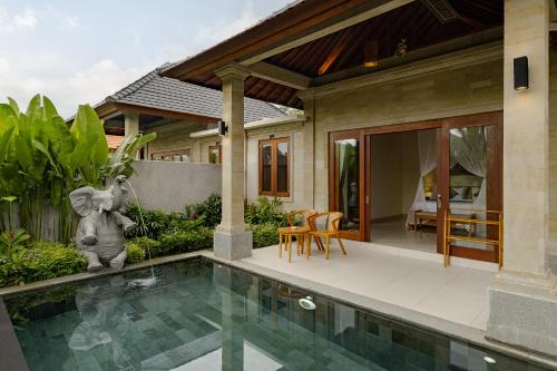 Bazén v ubytování Yanyan Resort Ubud nebo v jeho okolí