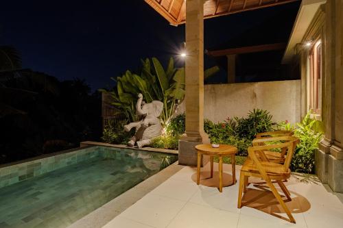 Bazén v ubytování Yanyan Resort Ubud nebo v jeho okolí
