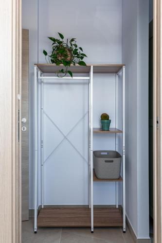 a sliding glass door with a plant on top at Vigne Marrone B&B in Fossacesia