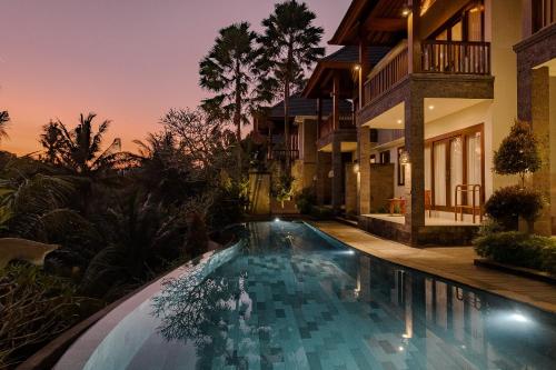 Bazén v ubytování Yanyan Resort Ubud nebo v jeho okolí
