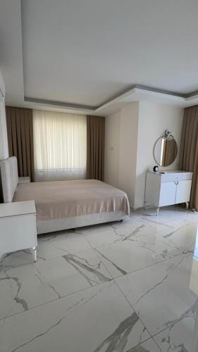 En eller flere senge i et værelse på Heavenhills