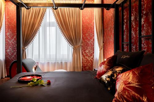 Una cama o camas en una habitación de Apartament Organza