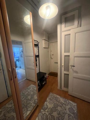a room with a door and a mirror in a room at dream room in Helsinki