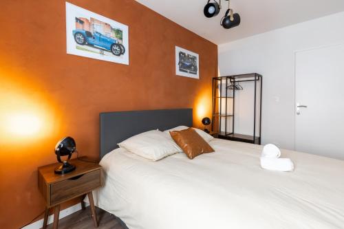 Ένα ή περισσότερα κρεβάτια σε δωμάτιο στο Automobile