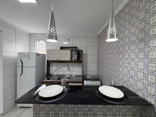 Kuchyň nebo kuchyňský kout v ubytování Apartamento nº03 No CENTRO de FOZ