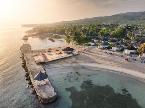 an aerial view of a resort with a swimming pool at Grand Muthu Runaway Bay Club Caribbean in Runaway Bay