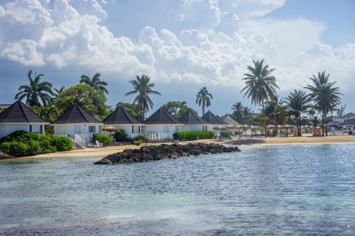 a view of a resort from the water at Grand Muthu Runaway Bay Club Caribbean in Runaway Bay