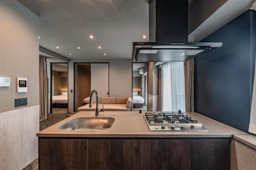 Kuchyň nebo kuchyňský kout v ubytování Apartment Hotel 11 Asakusa 2