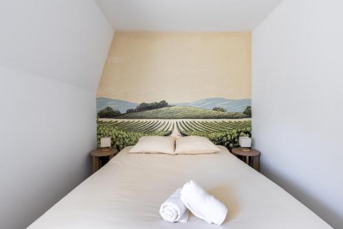 Llit o llits en una habitació de Route des vins