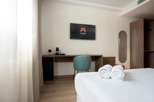 Ένα ή περισσότερα κρεβάτια σε δωμάτιο στο Alora Hotel Mérida