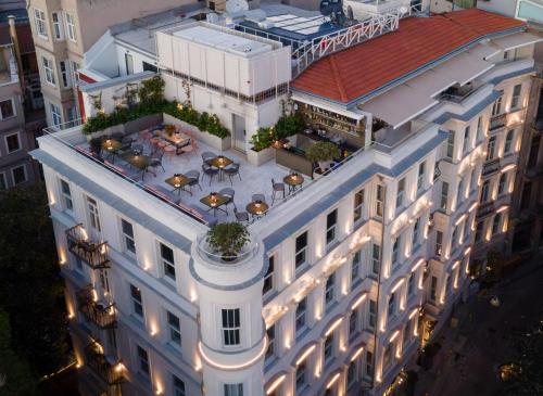 an overhead view of a building with a patio at Casa Foscolo Hotel, Istanbul, a Member of Design Hotels in Istanbul