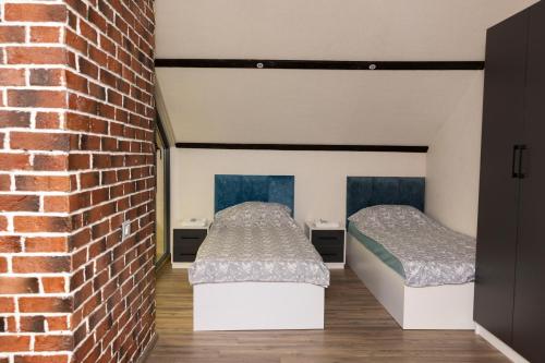 Harmony Escape tesisinde bir odada yatak veya yataklar