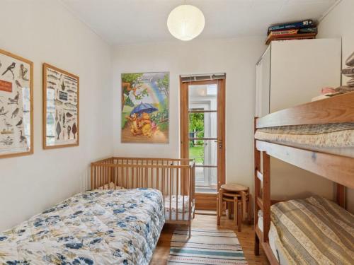 Katil atau katil-katil dalam bilik di Holiday Home Varma - 25m from the sea by Interhome