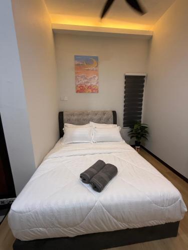 Katil atau katil-katil dalam bilik di AHM RoomSTAY