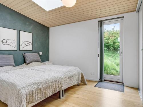 Katil atau katil-katil dalam bilik di Holiday Home Anny - 100m from the sea by Interhome