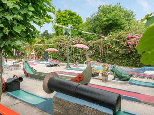 a childrens park with a water park at Holiday Home Gunlef - 50m from the sea by Interhome in Svendborg