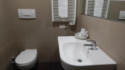 Ένα μπάνιο στο Hotel & Residence Castelli