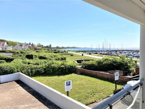 a view of a marina from the balcony of a house at Apartment Irma - 25m from the sea by Interhome in Tranekær