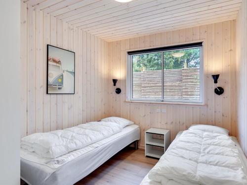 Katil atau katil-katil dalam bilik di Holiday Home Jorn - 75m from the sea by Interhome