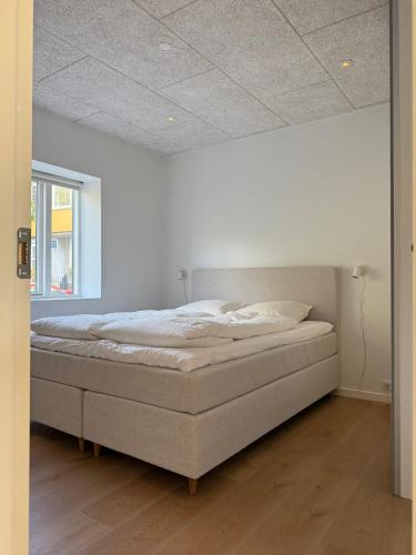 Postel nebo postele na pokoji v ubytování Modern apartment in the heart of Tórshavn