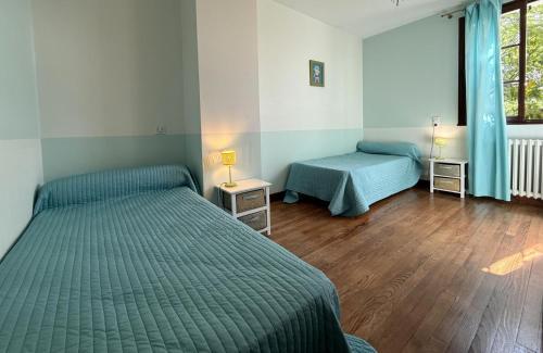 Ένα ή περισσότερα κρεβάτια σε δωμάτιο στο Coumassous