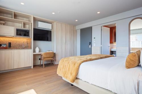 Un ou plusieurs lits dans un hébergement de l'établissement Hotel Acta Moa