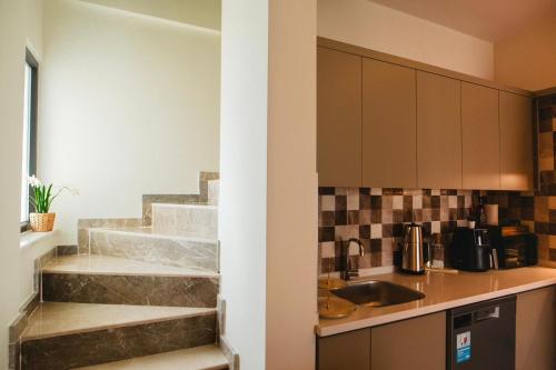 Kuchyň nebo kuchyňský kout v ubytování First Class by Antalya Suites