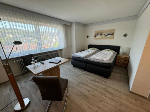Ένα ή περισσότερα κρεβάτια σε δωμάτιο στο Apartmenthaus Wilder Mann